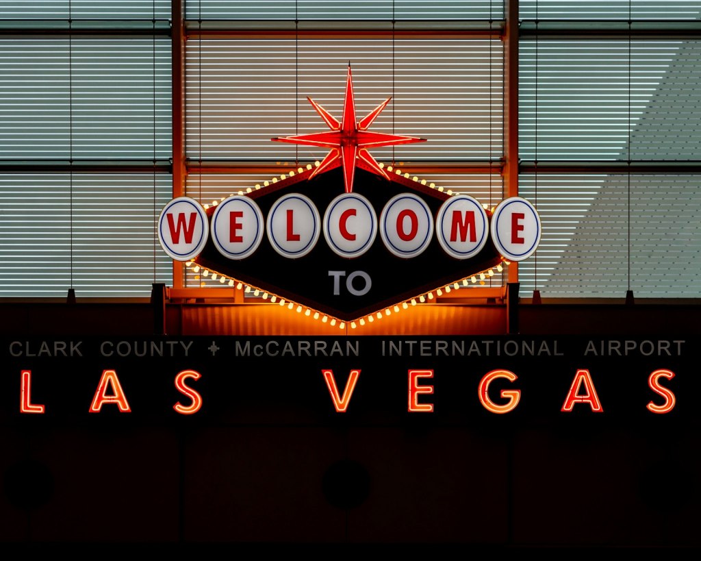 A lit-up Welcome to Fabulous Las Vegas sign at the Las Vegas airport