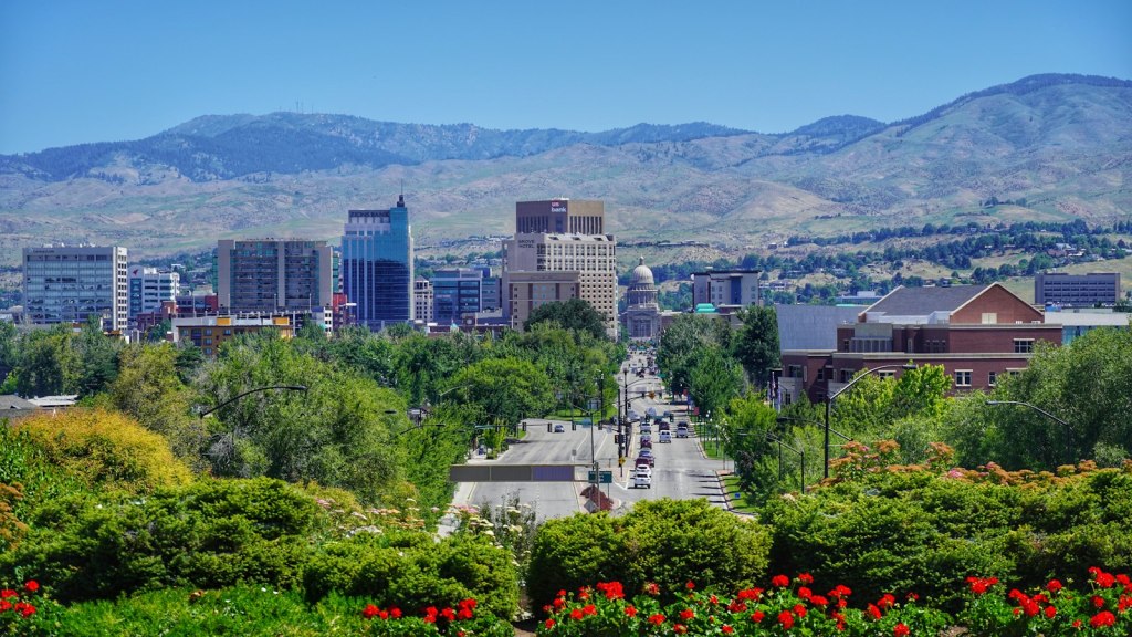 The downtown Boise, Idaho skyline under a blue sky during the day