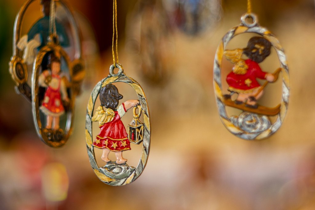 Colorful glass Christmas ornaments for sale at a market stall