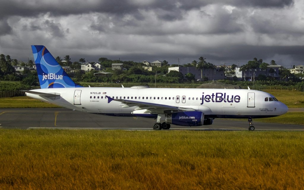A JetBlue Airways jet on an airport runway
