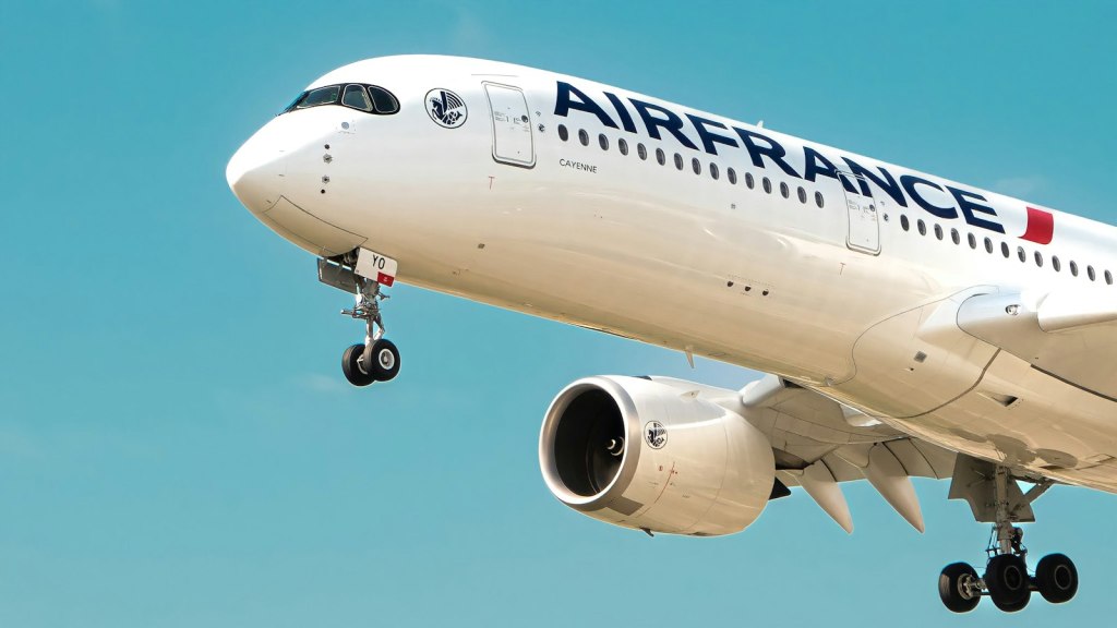 Air France Airbus A350 flying through a clear blue sky