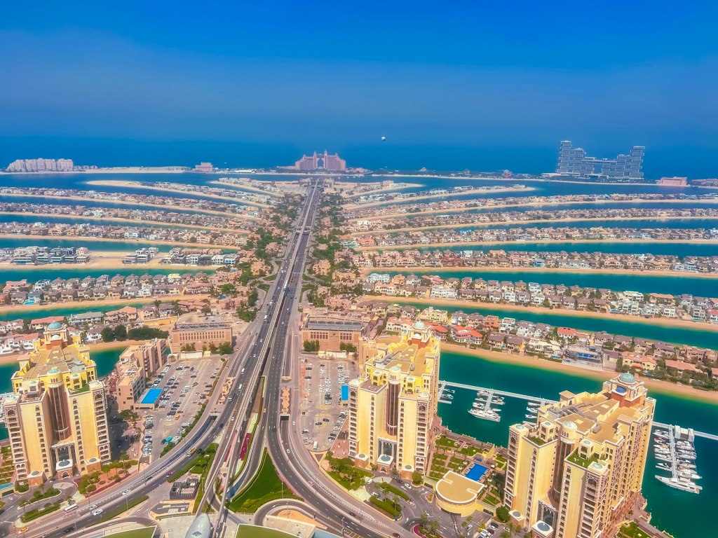 Aerial view of the palm-shaped Palm Jumeirah island in Dubai with the Atlantis resort