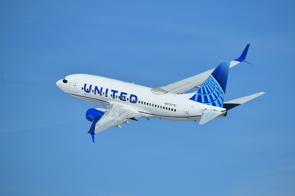 A United Airlines plane flying in the sky